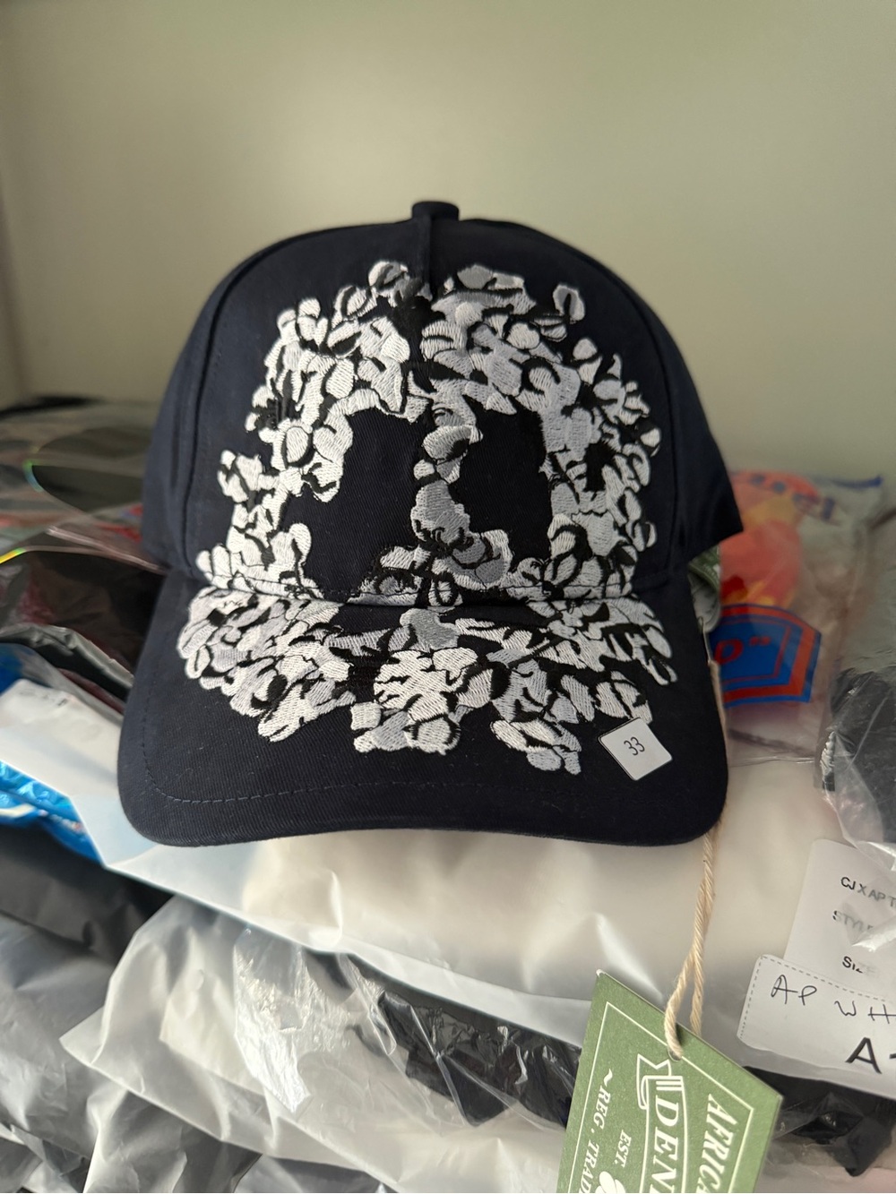Black Baseball Cap with White Floral Skull Embroidery